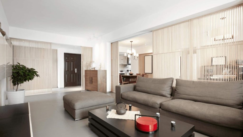 A living room with a couch and coffee table.