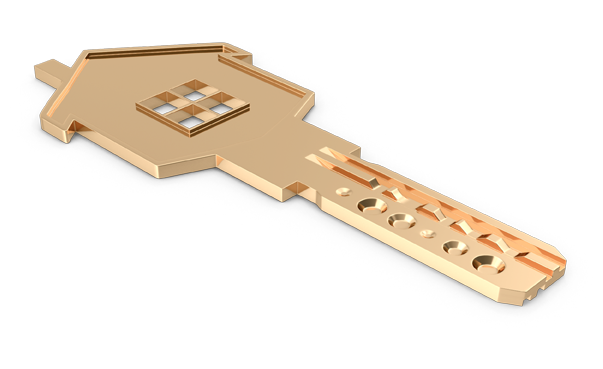A golden key shaped like a house, lying flat on a black surface, with intricate details on its head and shaft—a symbol of the Best Property Management in Halifax.