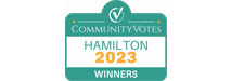 The CommunityVotes Hamilton 2023 Winners badge, featuring a teal and white design with a check mark logo, is a testament to excellence in the area, including standout achievements in Property Management Hamilton.
