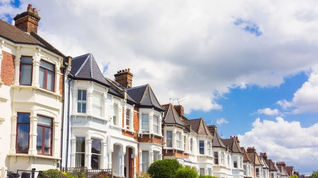 A row of terraced houses on a street in London, perfect for managing multiple rental properties.