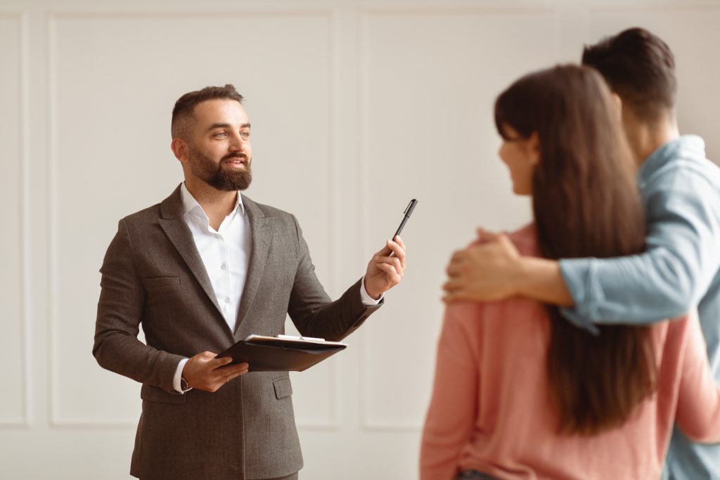 couple buying new apartment talking with house age 2025 03 18 18 39 19 utc