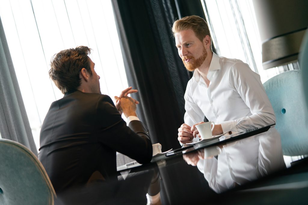 successful businessman smiling while discussing wi 2025 03 13 23 44 03 utc
